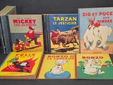 plusieurs livres pour enfants sont alignés sur une table