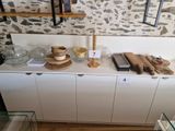 a display of various items on a table in a room