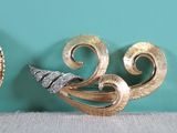 two brooches that are sitting next to each other