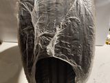 a plastic bag wrapped in plastic on top of a toilet