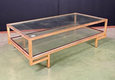 Table basse en verre à monture en métal doré, circa 1970. - Photo 1