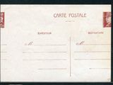 une vieille carte postale sur laquelle figure la photo d'un homme