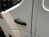 a white van with a red stripe on the side of it