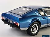 a blue model of a sports car on a white background