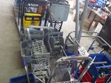 a lot of carts that are lined up in a room