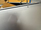 a laptop that is sitting on a table in a room