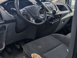 the interior of a truck with a steering wheel and dashboard