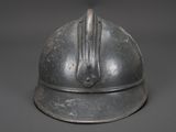 a silver helmet with a horse ' s head on it