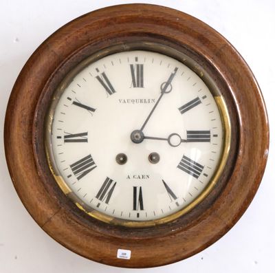 a wooden clock with roman numerals on the face