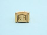 an image of a gold ring with the letter r on it