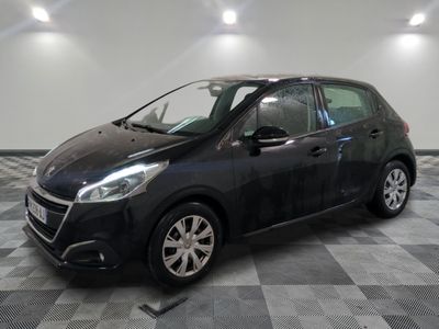 a picture of a black car parked in a garage