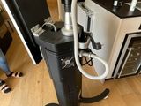 a machine that is sitting on top of a wooden floor