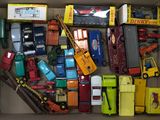 a box full of toy cars and trucks in it