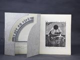 an open book with a picture of a person sitting on a boat