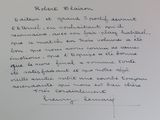 handwriting written on a piece of white paper with a black marker