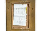 a picture of a piece of paper taped to a picture frame