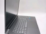 a laptop that is sitting on a white table
