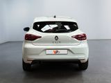 a white car that is parked in a room