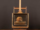 tableau représentant un nu posé sur un chevalet en bois d'où dépasse un bâton en bois