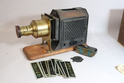 a small camera with a lot of cards on the table