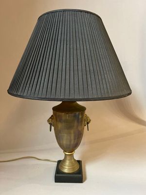 an image of a lamp with a black shade on top of it
