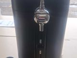 an image of a beer dispenser sitting on a table