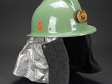 green hard hat with orange number 5 on the side