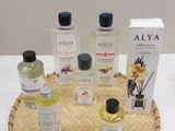 a tray with a lot of bottles of perfume on it