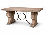une photo d'une table en bois avec un piètement en fer forgé