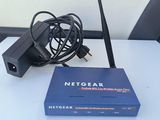 a blue box with a black wire and a blue box with a black wire