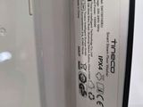 a close up of the back of a white refrigerator with a label on it