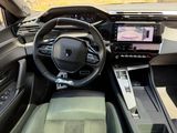 the interior of a car with a steering wheel, dashboard, and dash board