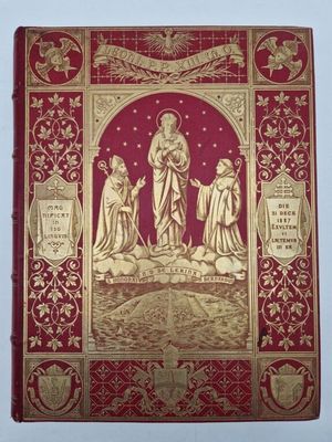 a red and gold book with a picture of jesus and other people on it