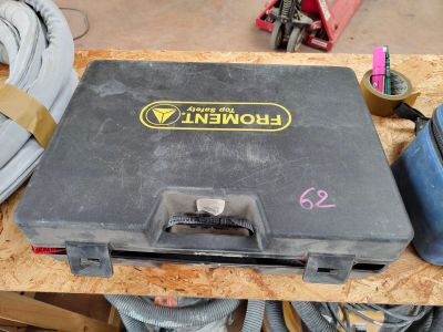 a tool box sitting on top of a wooden table