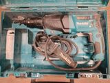 a blue tool in a blue case on a table