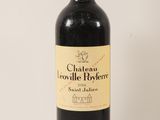 bottle of red wine on a white background with a red cap