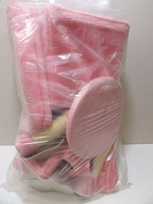 a pink bag of makeup brushes and a pink bag of makeup brushes