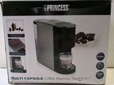 packaging of a coffee machine sitting on top of a white counter