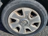 a close up of a tire on a car ' s rim