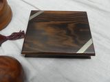 a wooden box that is sitting on a table