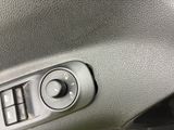 a close up of a button on a car ' s dashboard