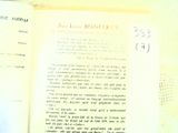 an open book with writing on it sitting on a table