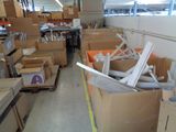 a room with many boxes and boxes on the floor