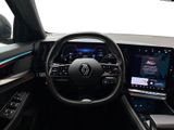 the interior of a car with a steering wheel, dashboard, and touch screen