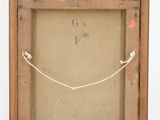 an old wooden frame with a picture of a smiling face on it