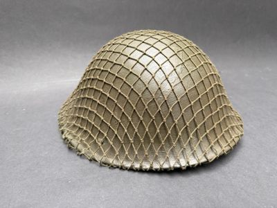 a close up of a helmet on a gray surface
