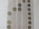 a lot of coins in a plastic bag on a table