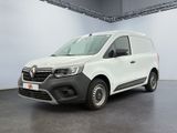 the white van is parked in a large room