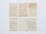 un ensemble de quatre lettres manuscrites sur une feuille de papier