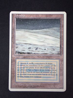 a close up of a card with a picture of a snow covered mountain